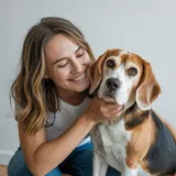 Happy pet owner with medium pet